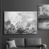 Opere di Hengki Koentjoro: un banco di pesci nuota tra coralli vibranti, un'onda potente si infrange e un corallo ramificato in primo piano.