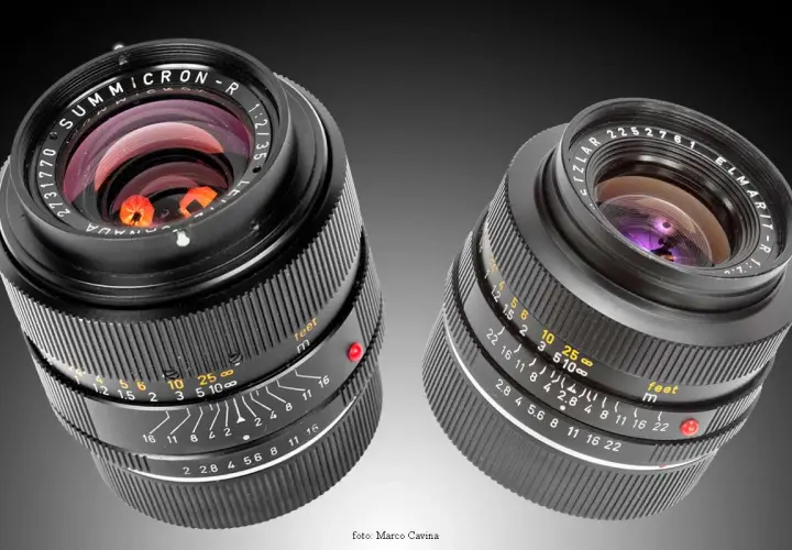 Due obiettivi Leitz Leica Summicron-R e Elmarit-R, con dettagli delle ghiere di messa a fuoco e diaframma.