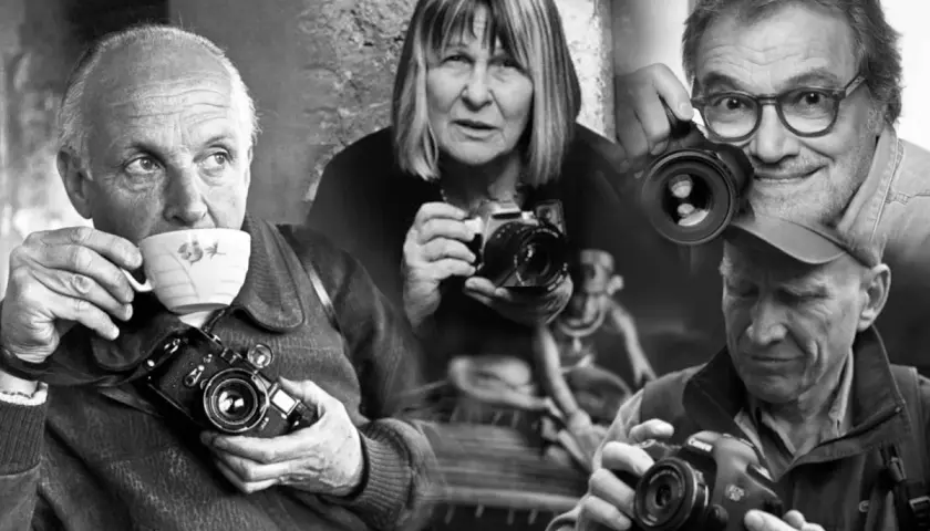 Un collage di volti di fotografi, tra cui un noto fotografo italiano, con macchine fotografiche in mano.