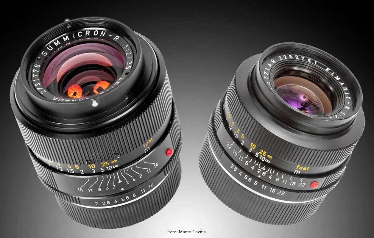 Due obiettivi Leitz Leica Summicron-R e Elmarit-R, con dettagli delle ghiere di messa a fuoco e diaframma.